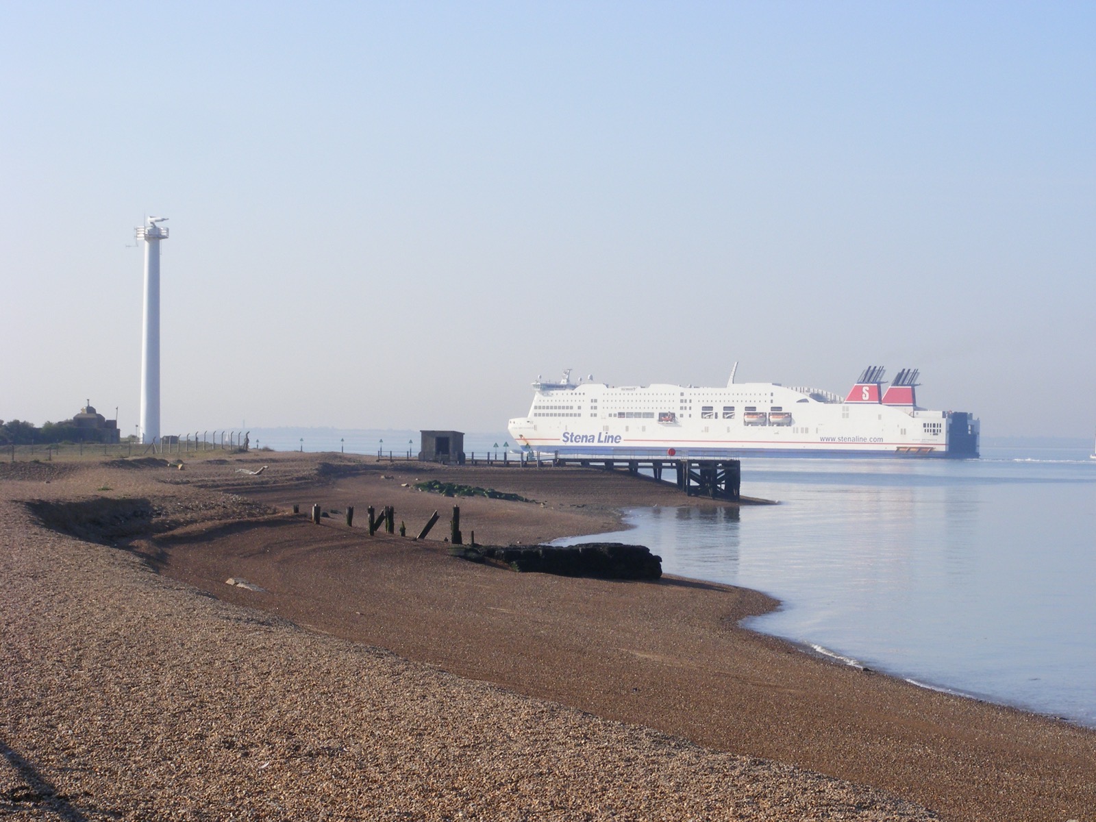 Landguard Point, Felixstowe with a ferry passing